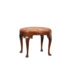 A WALNUT OVAL STOOL, IN QUEEN ANNE STYLE