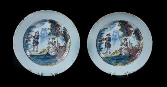 A PAIR OF ENGLISH DELFT POLYCHROME PLATES