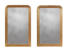 A PAIR OF FRENCH GILTWOOD AND COMPOSITION WALL MIRRORS OR OVERMANTEL MIRRORS