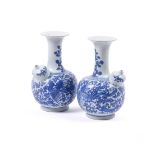 A PAIR OF CHINESE BLUE AND WHITE KENDI IN KANGXI STYLE