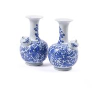 A PAIR OF CHINESE BLUE AND WHITE KENDI IN KANGXI STYLE