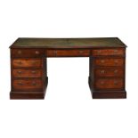 A MAHOGANY TWIN PEDESTAL PARTNER'S DESK IN GEORGE III STYLE