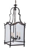 A PAIR OF BRONZED PENTAGONAL HALL LANTERNS IN REGENCY STYLE