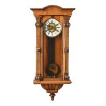 A WALNUT VIENNA STYLE WALL CLOCK