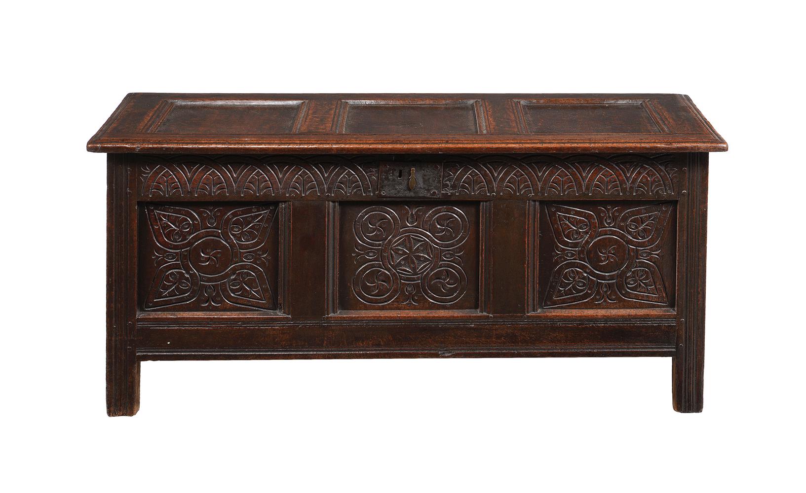 A CHARLES II PANELLED OAK CHEST