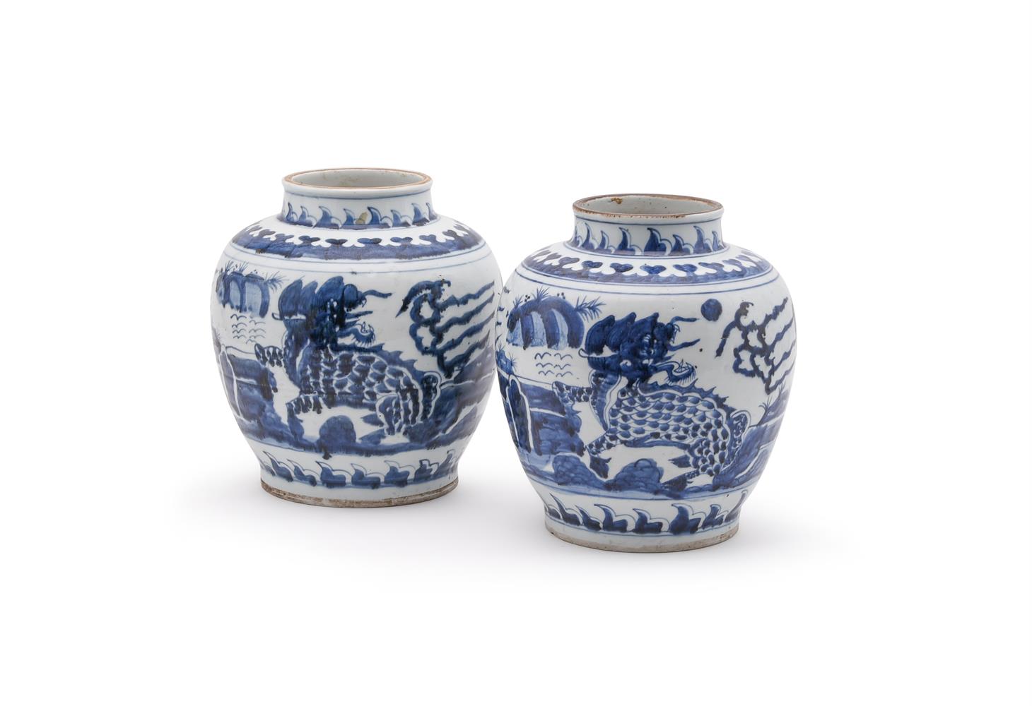 A PAIR OF CHINESE BLUE AND WHITE KYLIN JARS IN 17TH CENTURY STYLE