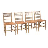 A SET OF FOUR FAUX BAMBOO SIDE CHAIRS