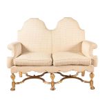 A GILTWOOD TWO SEAT SOFA IN LATE 17TH CENTURY STYLE
