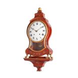 A RED LACQUERED BRACKET CLOCK