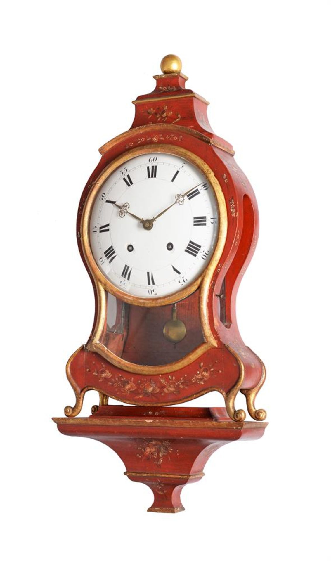 A RED LACQUERED BRACKET CLOCK