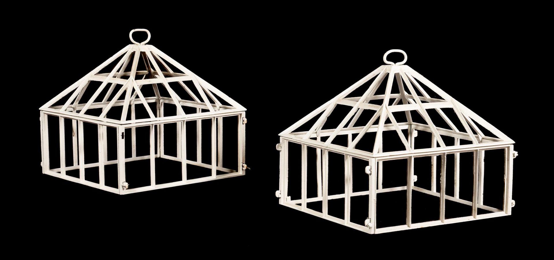 A PAIR OF WHITE PAINTED METAL CLOCHES IN VICTORIAN STYLE