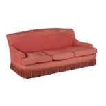 A PAIR OF CORAL PINK UPHOLSTERED THREE SEAT SOFAS