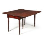 A REGENCY MAHOGANY CONCERTINA EXTENDING DINING TABLE