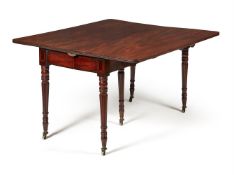 A REGENCY MAHOGANY CONCERTINA EXTENDING DINING TABLE