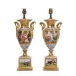 A PAIR OF PARIS PORCELAIN PALE BLUE GROUND AND GILT TWO HANDLED VASES, IN EMPIRE STYLE