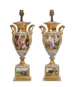 A PAIR OF PARIS PORCELAIN PALE BLUE GROUND AND GILT TWO HANDLED VASES, IN EMPIRE STYLE