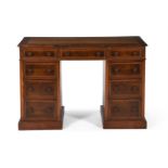 A MAHOGANY TWIN PEDESTAL DESK