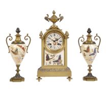 A FRENCH GILT BRASS AND GLASS-BEAD HIGHLIGHTED PORCELAIN MANTEL CLOCK GARNITURE