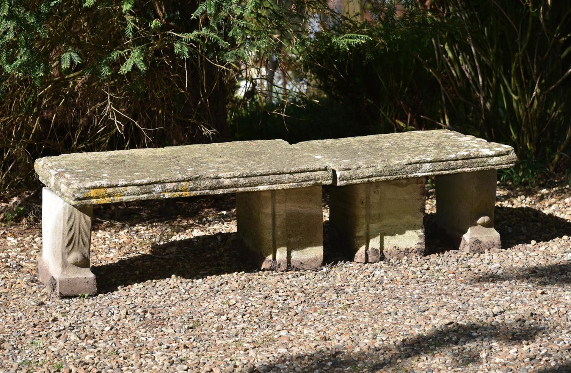 A CARVED SANDSTONE GARDEN BENCH