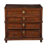 A CHARLES II OAK CHEST OF DRAWERS