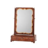 A GEORGE III MAHOGANY AND PARCEL GILT DRESSING MIRROR