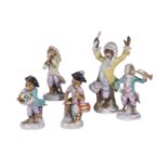 FIVE GERMAN PORCELAIN MONKEY BAND FIGURES AFTER THE MEISSEN ORIGINALS