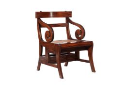 A MAHOGANY METAMORPHIC ARMCHAIR