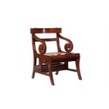 A MAHOGANY METAMORPHIC ARMCHAIR