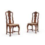 A PAIR OF DUTCH CARVED AND FIGURED WALNUT SIDE CHAIRS IN 18TH CENTURY STYLE