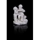 A SEVRES BISCUIT PORCELAIN FIGURAL GROUP