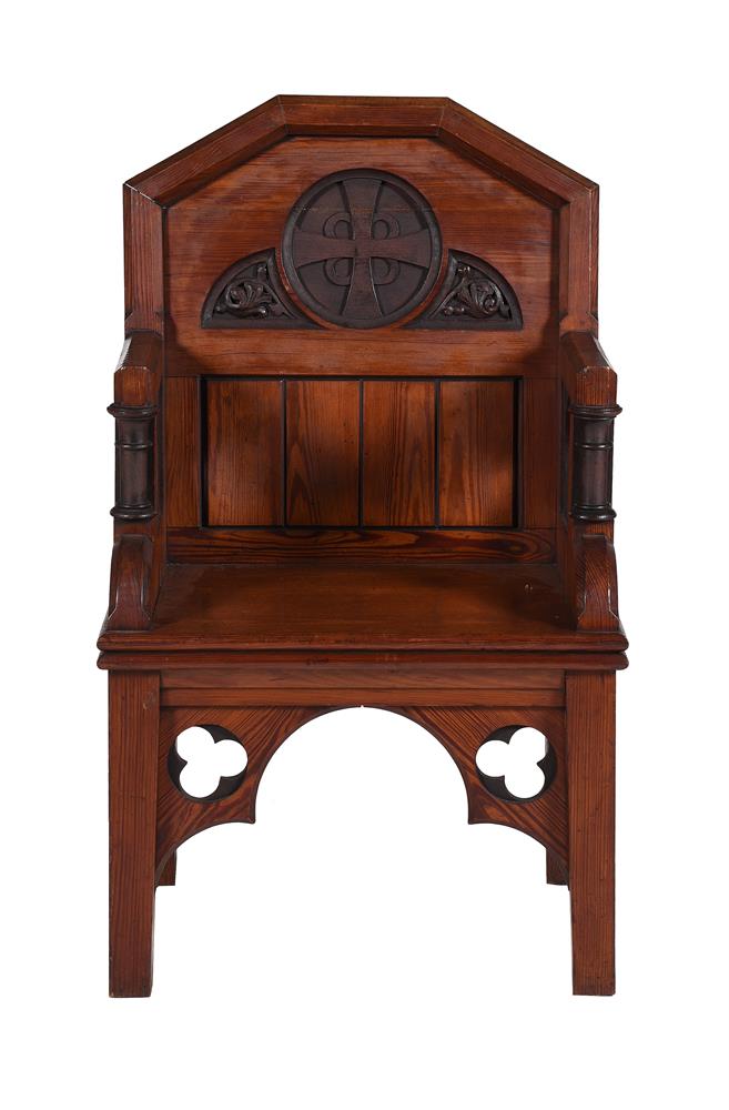 A VICTORIAN PITCH PINE THRONE ARMCHAIR, BY COX & SONS