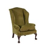 A MAHOGANY AND GREEN UPHOLSTERED ARMCHAIR IN GEORGE III STYLE