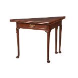 A GEORGE II MAHOGANY TRIANGULAR FOLDING TEA TABLE