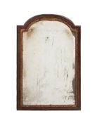 A WALNUT AND PARCEL GILT WALL MIRROR