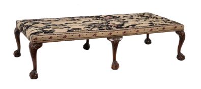 A MAHOGANY DAY BED OR CENTRE STOOL IN GEORGE III STYLE