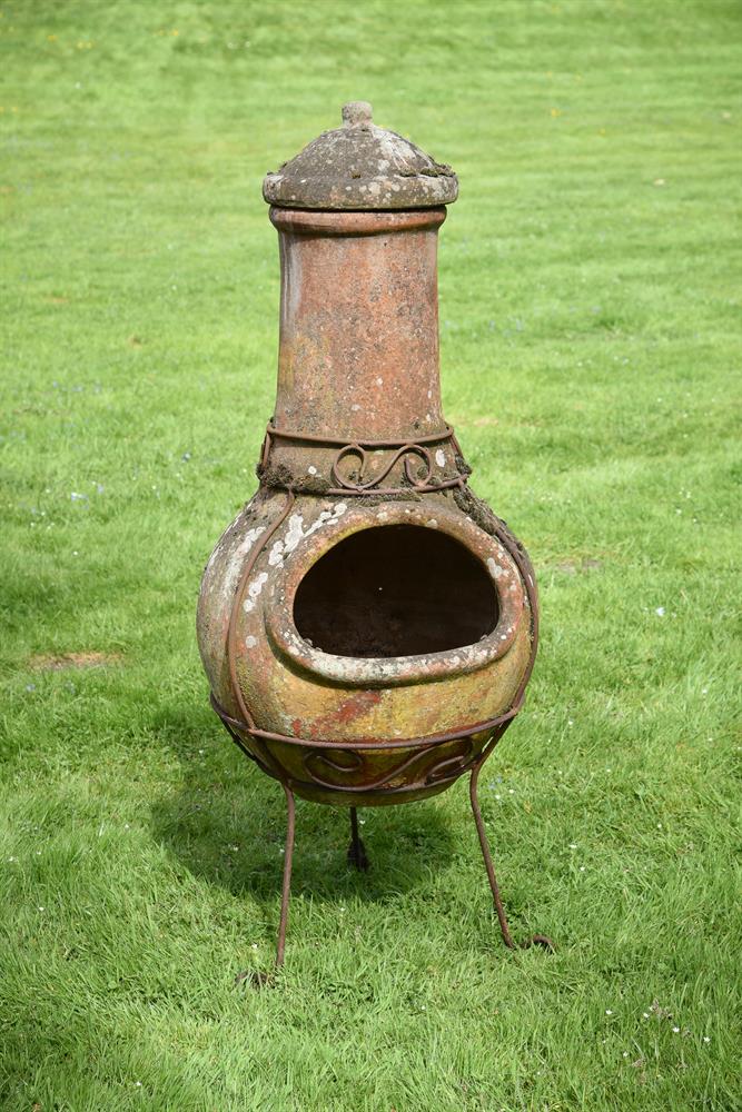 A MODERN TERRACOTTA CHIMENEA