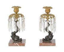 A PAIR OF REGENCY BRONZE AND GILT METAL TABLE LUSTRES