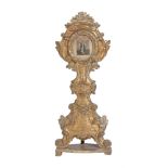 A GILTWOOD RELIQUARY SHRINE