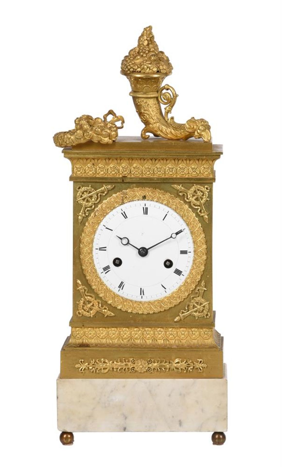 A FRENCH GILT METAL MANTEL CLOCK