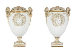 A PAIR OF MEISSEN SNAKE HANDLED AND MEDUSA MASK POT-POURRI VASES AND PIERCED COVERS