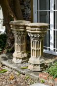 A PAIR OF AUSTIN AND SEELEY STONE COMPOSITION 'RICH GOTHIC' PEDESTALS