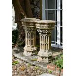 A PAIR OF AUSTIN AND SEELEY STONE COMPOSITION 'RICH GOTHIC' PEDESTALS