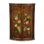 A POLYCHROME PAINTED CORNER CABINET