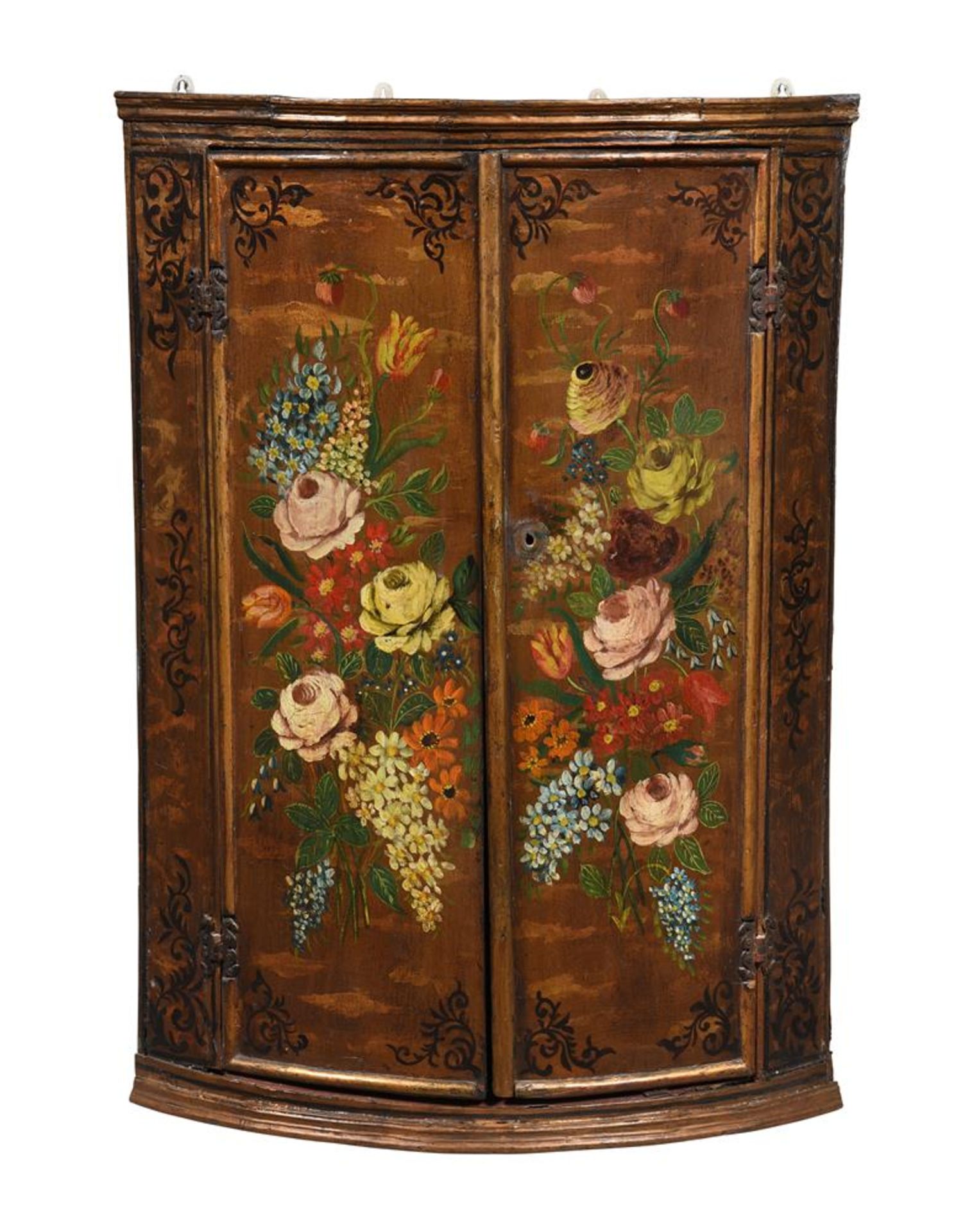 A POLYCHROME PAINTED CORNER CABINET