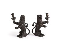A PAIR OF BRONZE LION CANDLESTICKS, IN 17TH CENTURY STYLE, LATE 19TH CENTURY