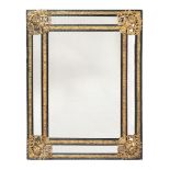 A CONTINENTAL EBONISED AND GILT METAL MOUNTED WALL MIRROR, SECOND HALF 19TH CENTURY
