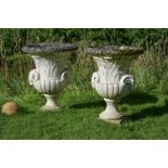 A PAIR OF WHITE PAINTED COMPOSITION URNS, IN THE NEOCLASSICAL TASTE, 20TH CENTURY