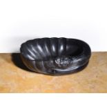 A CARVED BLACK MARBLE BOWL OR LABRUM, ITALIAN, 18TH CENTURY