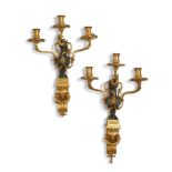 A PAIR OF FRENCH ORMOLU THREE LIGHT WALL SCONCES, POSSIBLY BY ÉMMANUEL ZWIENER, CIRCA 1860