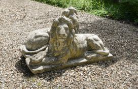A PAIR OF COMPOSITION STONE LIONS, 20TH CENTURY